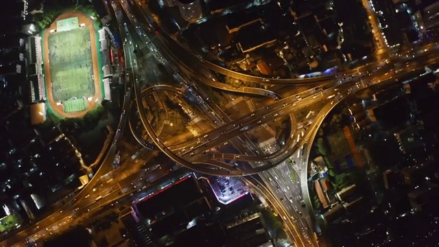航拍视角下的上海夜景内环共和新路立交桥俯拍4K高清视频视频素材