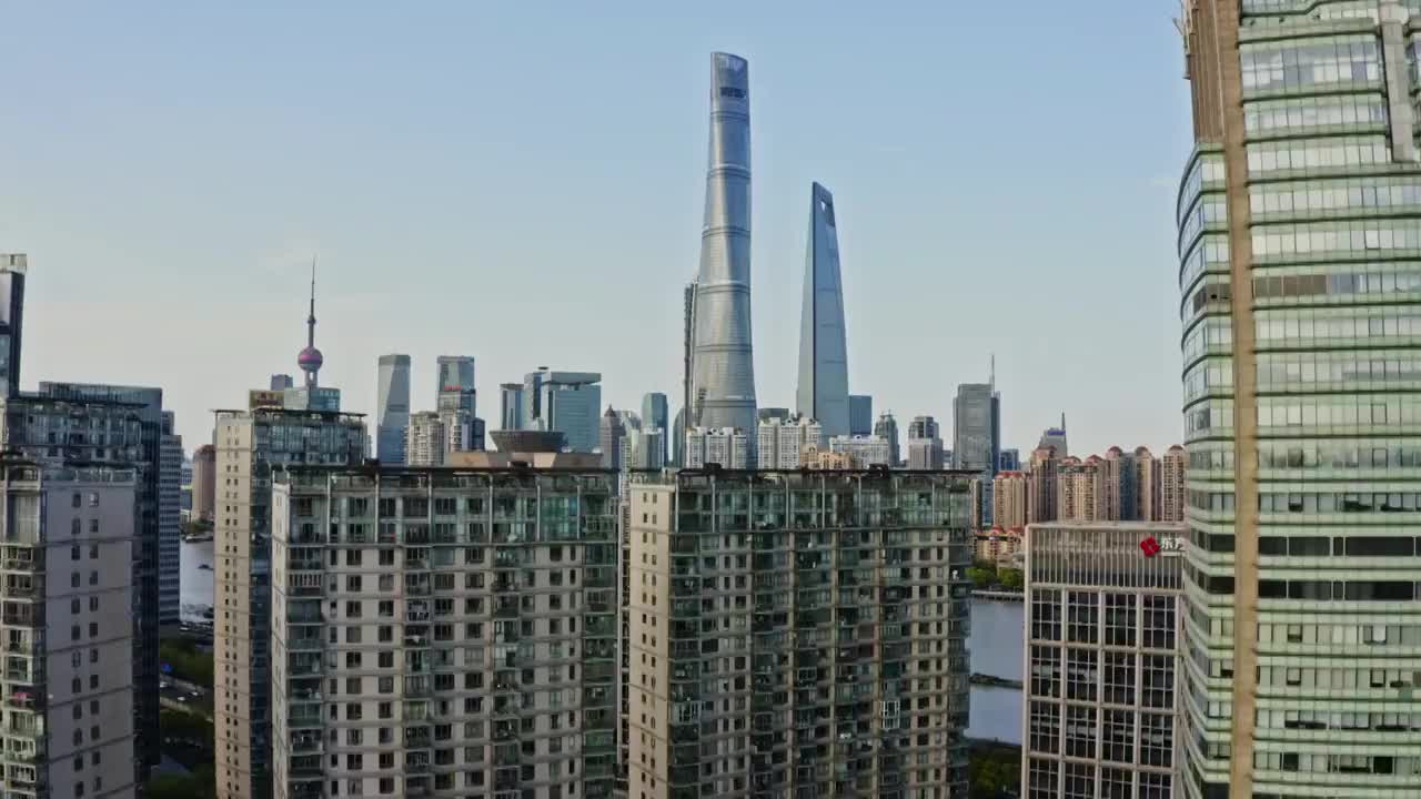 上海陆家嘴航拍从楼群中上升视频素材