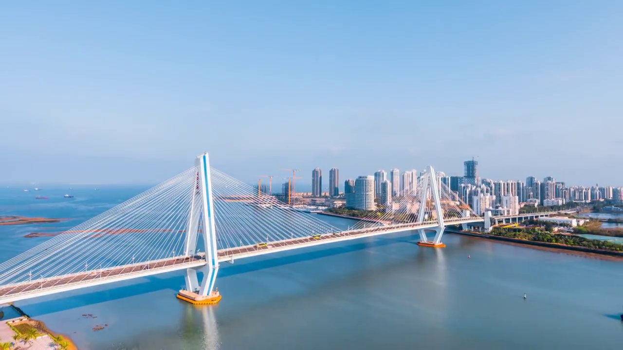 中国海南海口海甸河世纪大桥高视角晴天延时摄影视频素材
