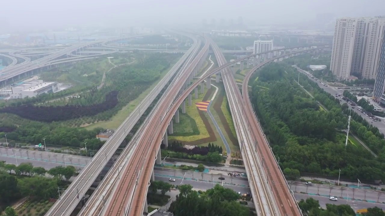 郑州东站高铁线及东站附近东三环和陇海高架立交视频素材