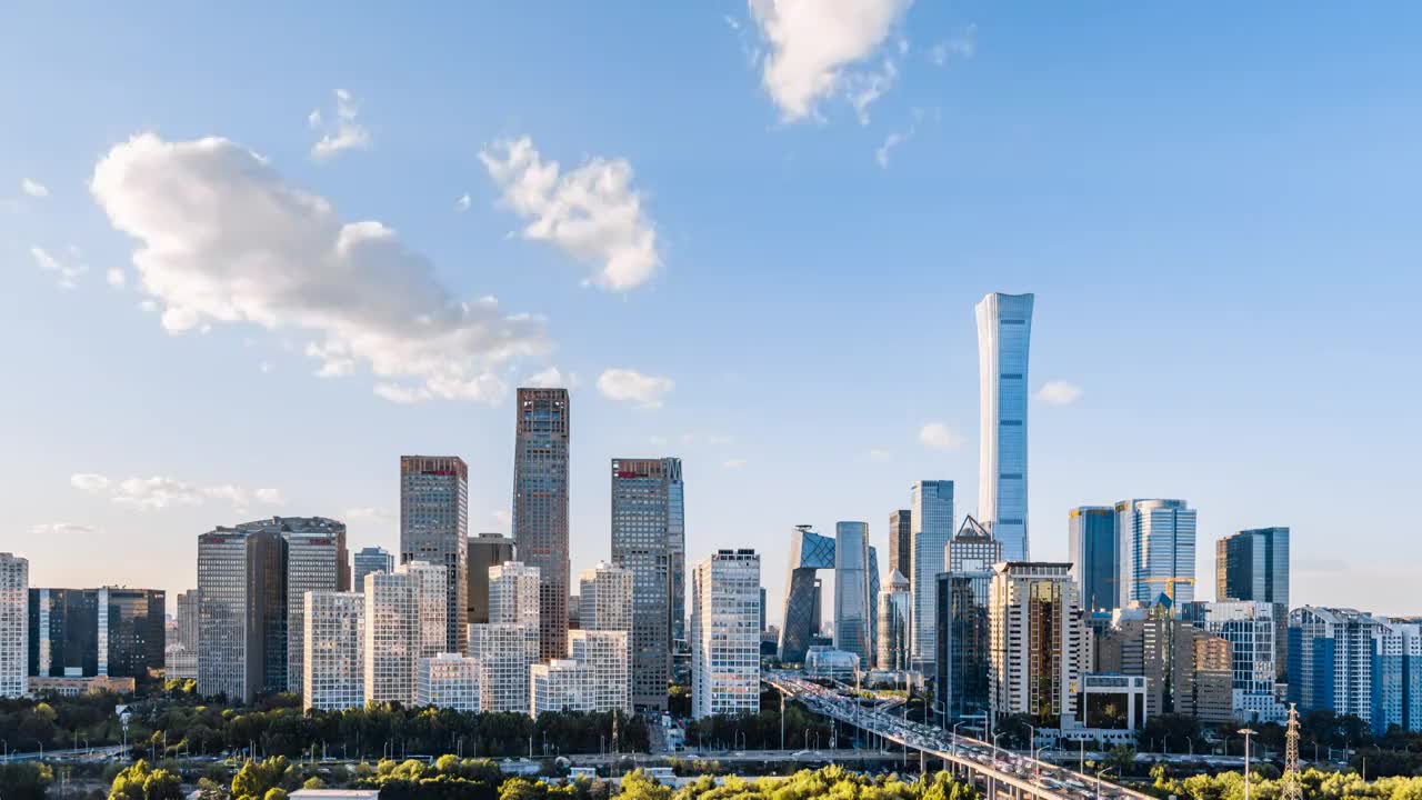中国北京CBD建筑群和城市车流晴天延时摄影视频素材