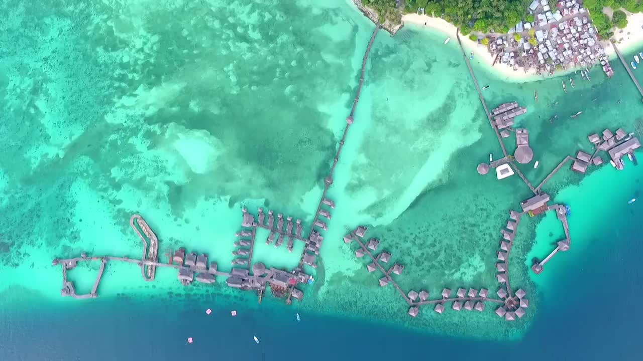 马来西亚沙巴州亚庇仙本那马布岛水屋60帧航拍视频影片视频素材