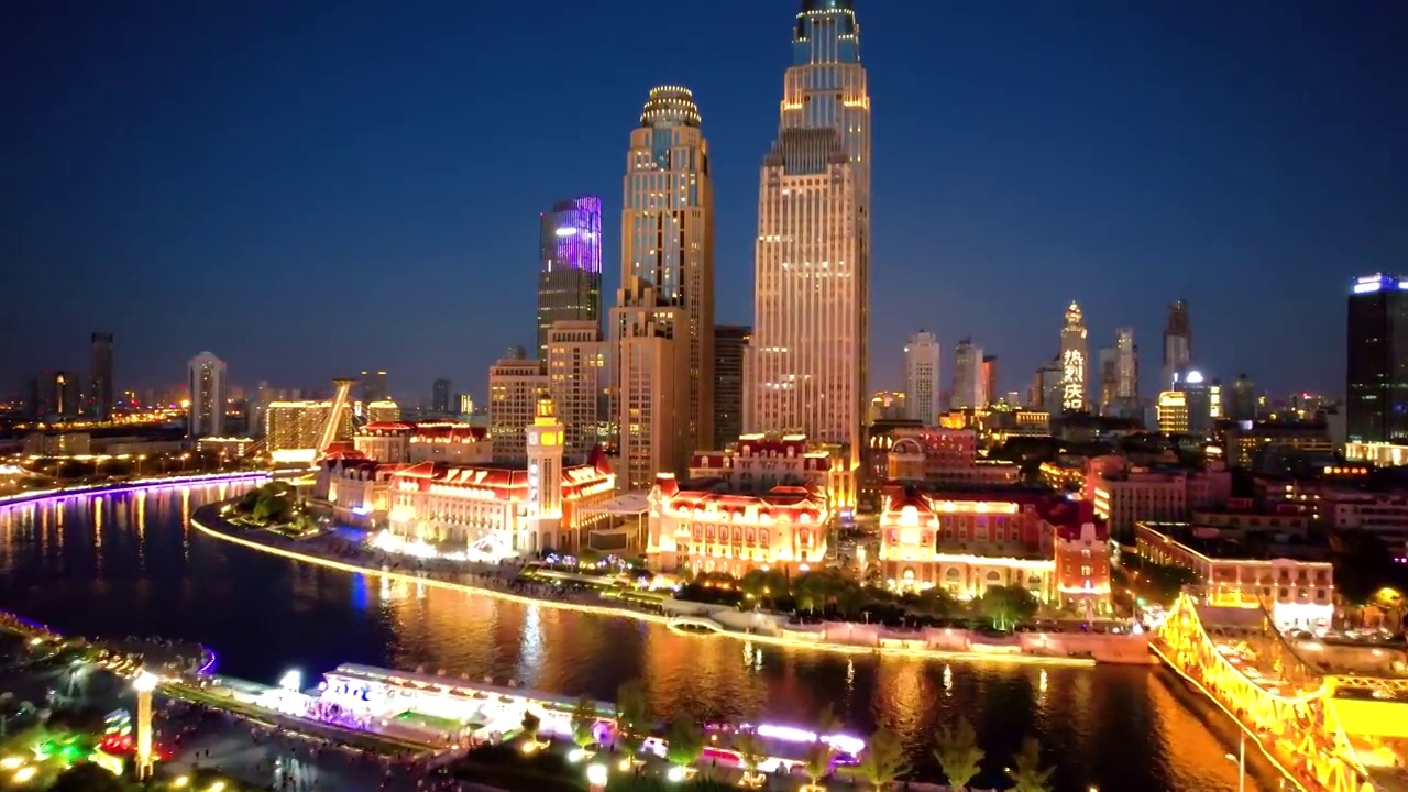 中国天津津湾广场和世纪钟CBD城市天际线夜景航拍视频素材