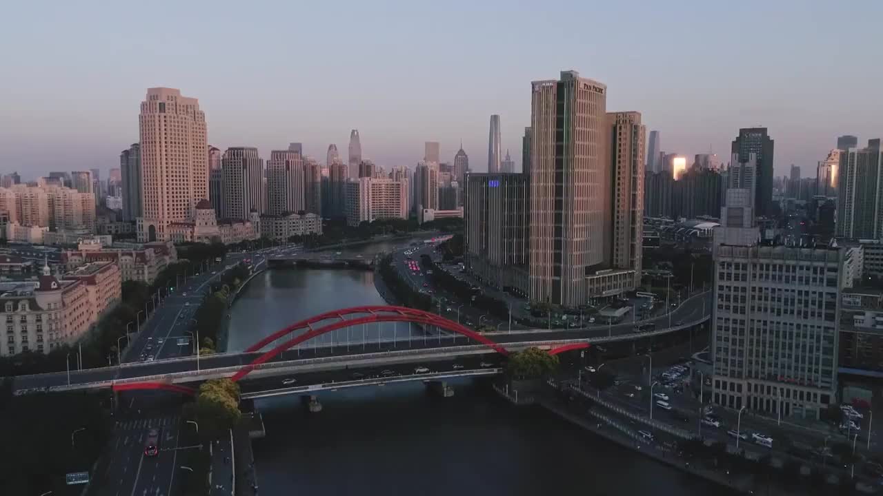 无人机航拍金融城市天津海河高楼建筑日落河流视频素材
