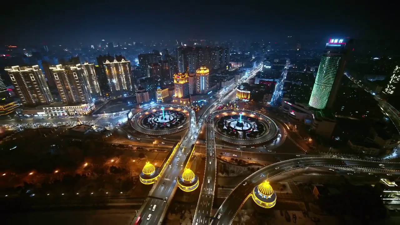 4K航拍哈尔滨东北城市夜景交通车流视频素材