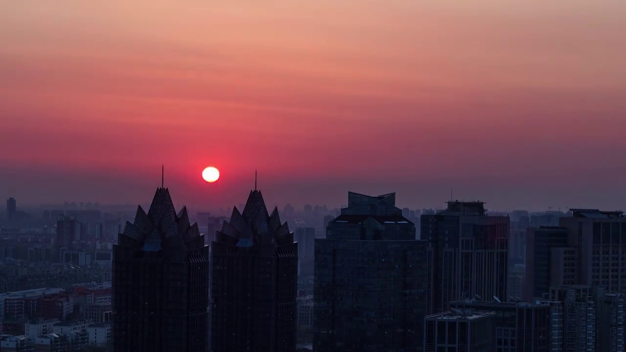 郑州城市CBD千禧广场大玉米日出日落落延时摄影视频素材