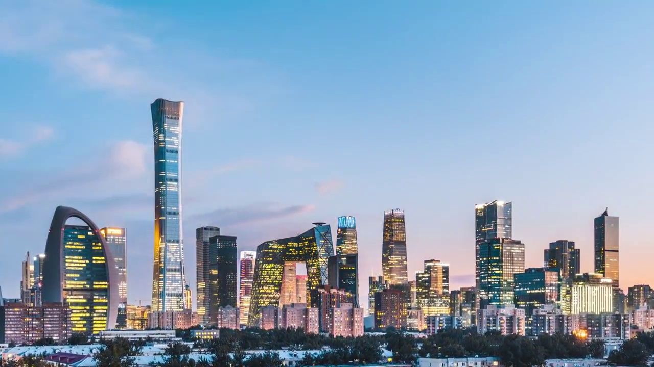 中国北京CBD建筑群晚霞日转夜延时摄影视频素材
