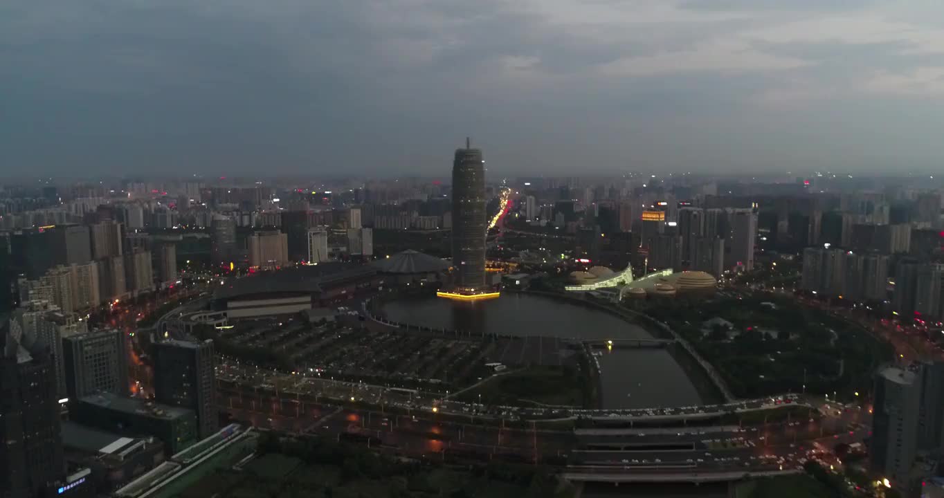 河南郑州郑东新区CBD夏季黄昏时分户外风光航拍视角视频素材