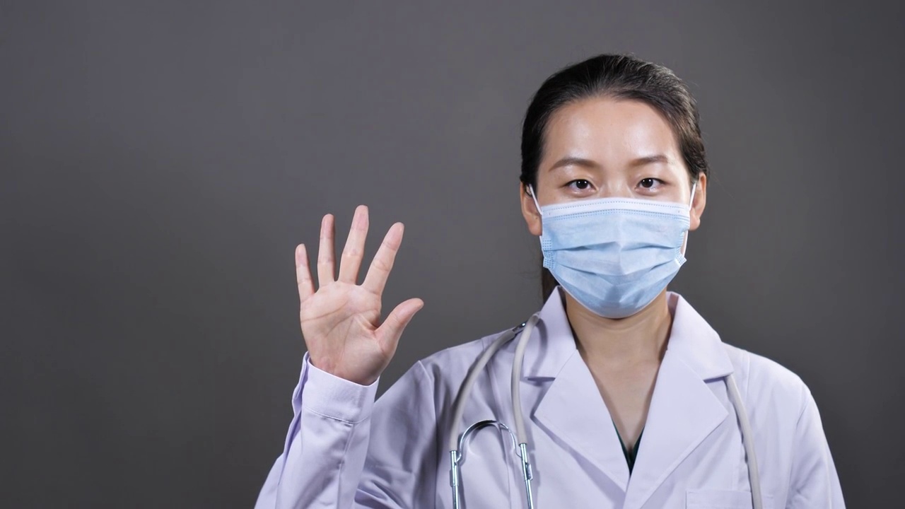 亚洲中国女性女士女医生医师比手势视频素材