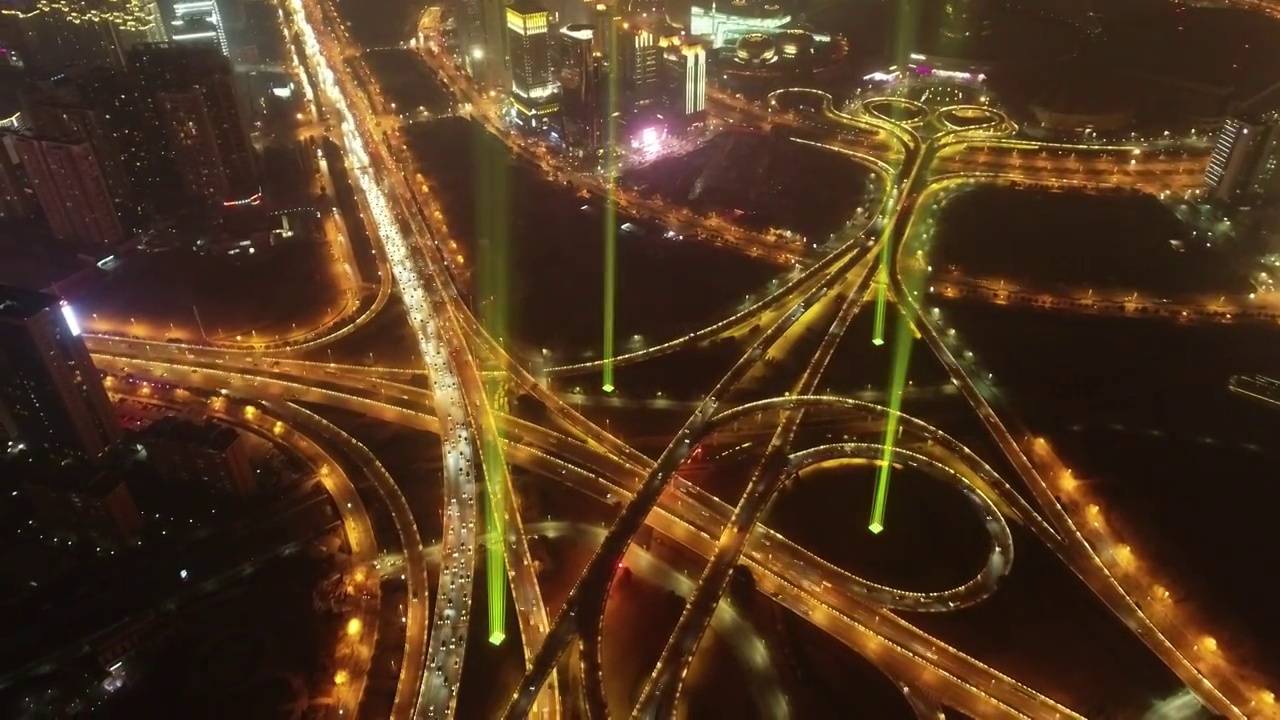 河南郑州郑东新区城市风光与都市天际夜景灯光秀激光照明航拍视角视频素材