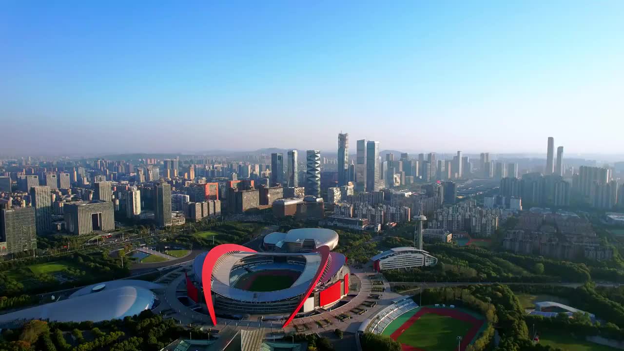 中国江苏南京奥体中心体育场和河西CBD城市天际线航拍风光视频素材