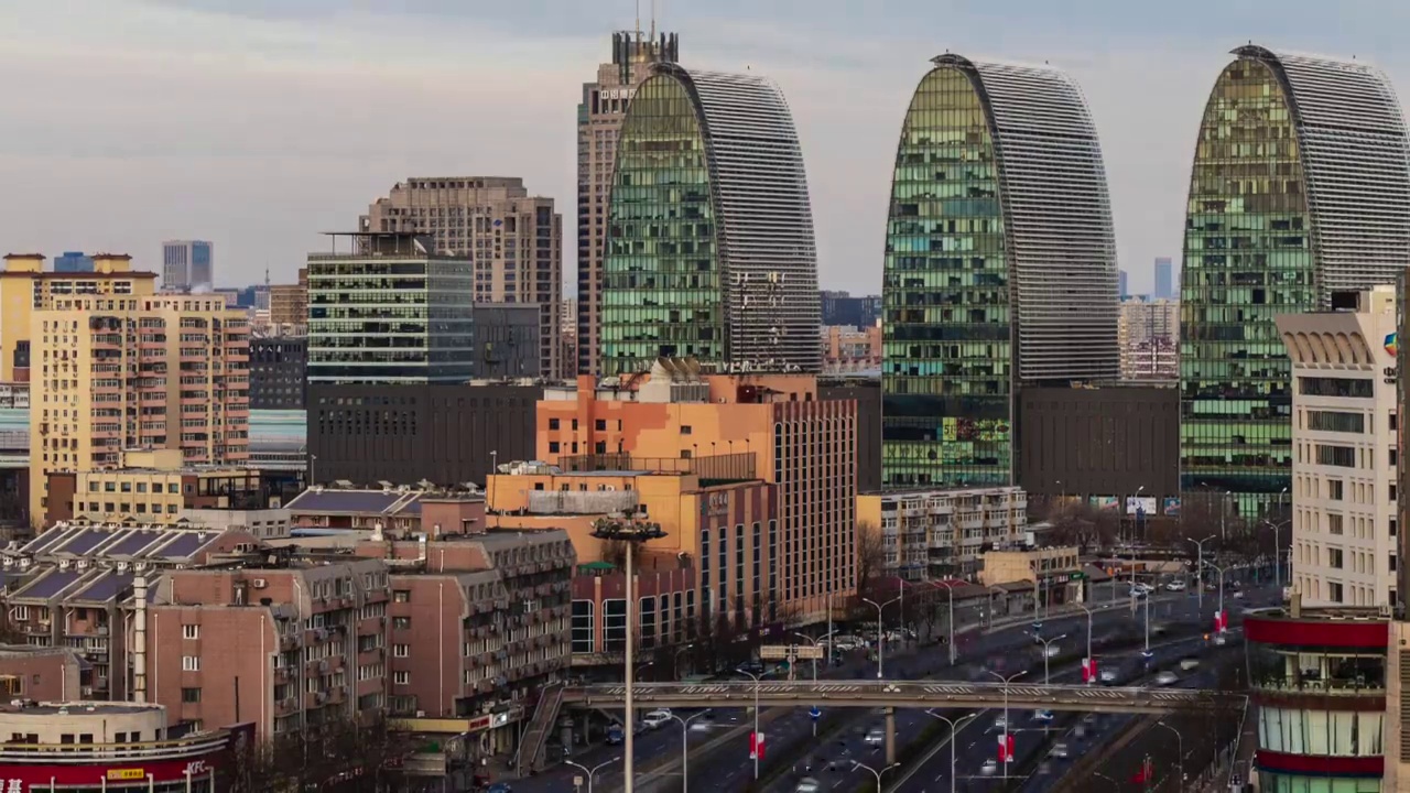 高角度拍摄北京西直门建筑车流日转夜视频素材