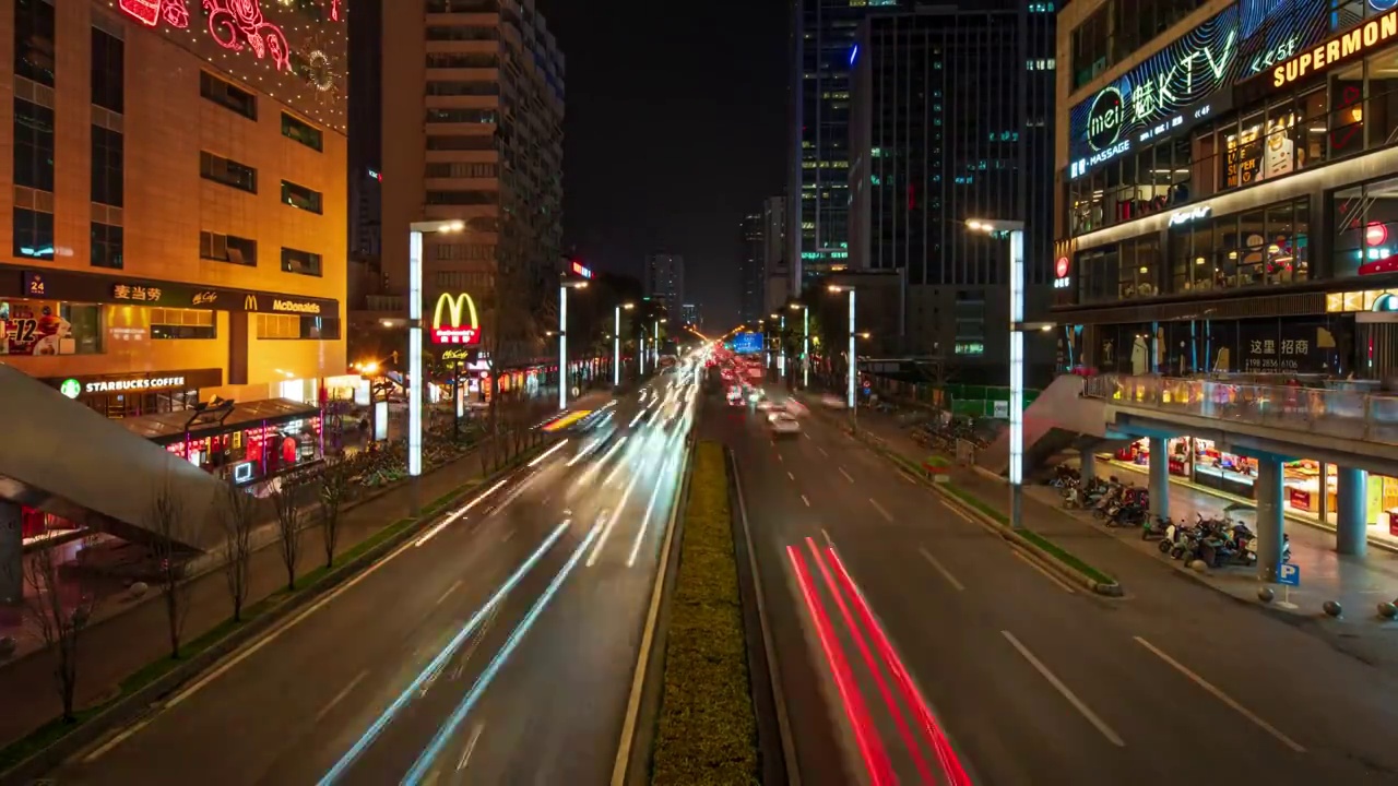 成都市春熙路口道路车流延时摄影8K视频素材