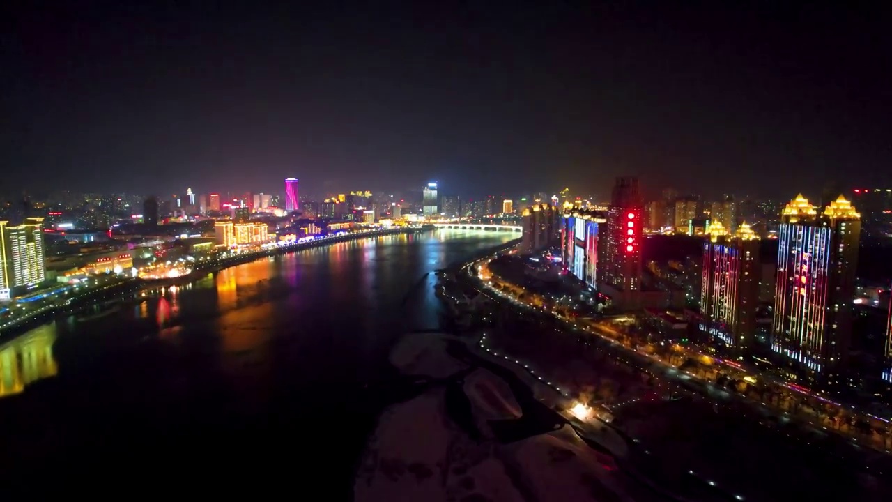 4k吉林市松花江沿岸风光节日灯火城市夜景航拍视频素材