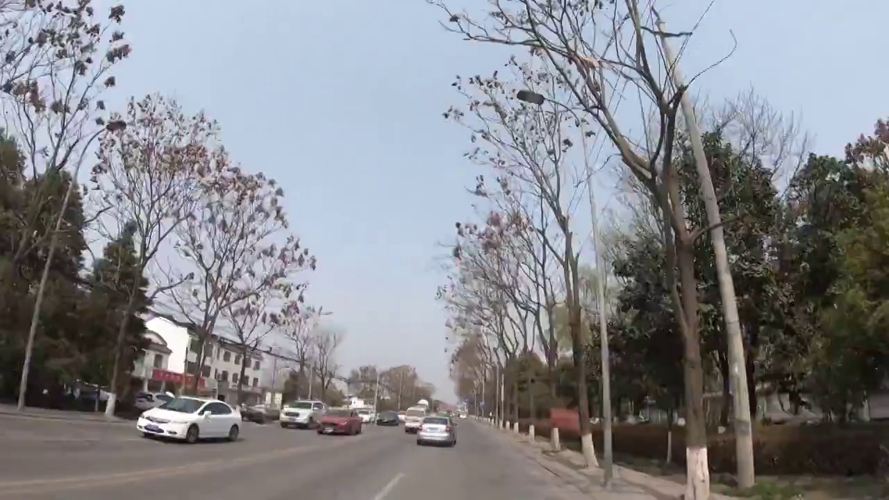 城市道路延时风光：汽车在成都郫都区G245国道上行驶视频素材