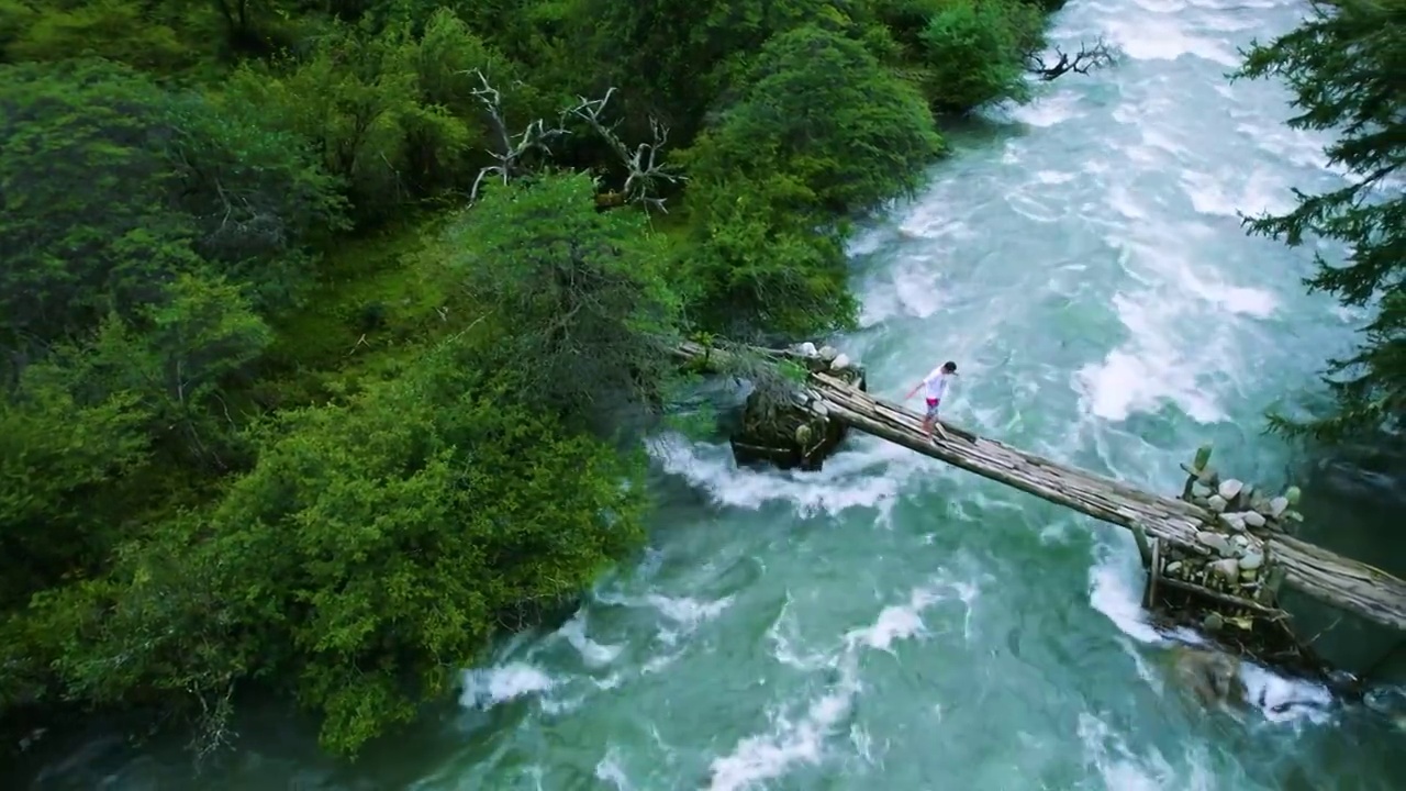 航拍藏族河流铁锁木桥航拍视频素材