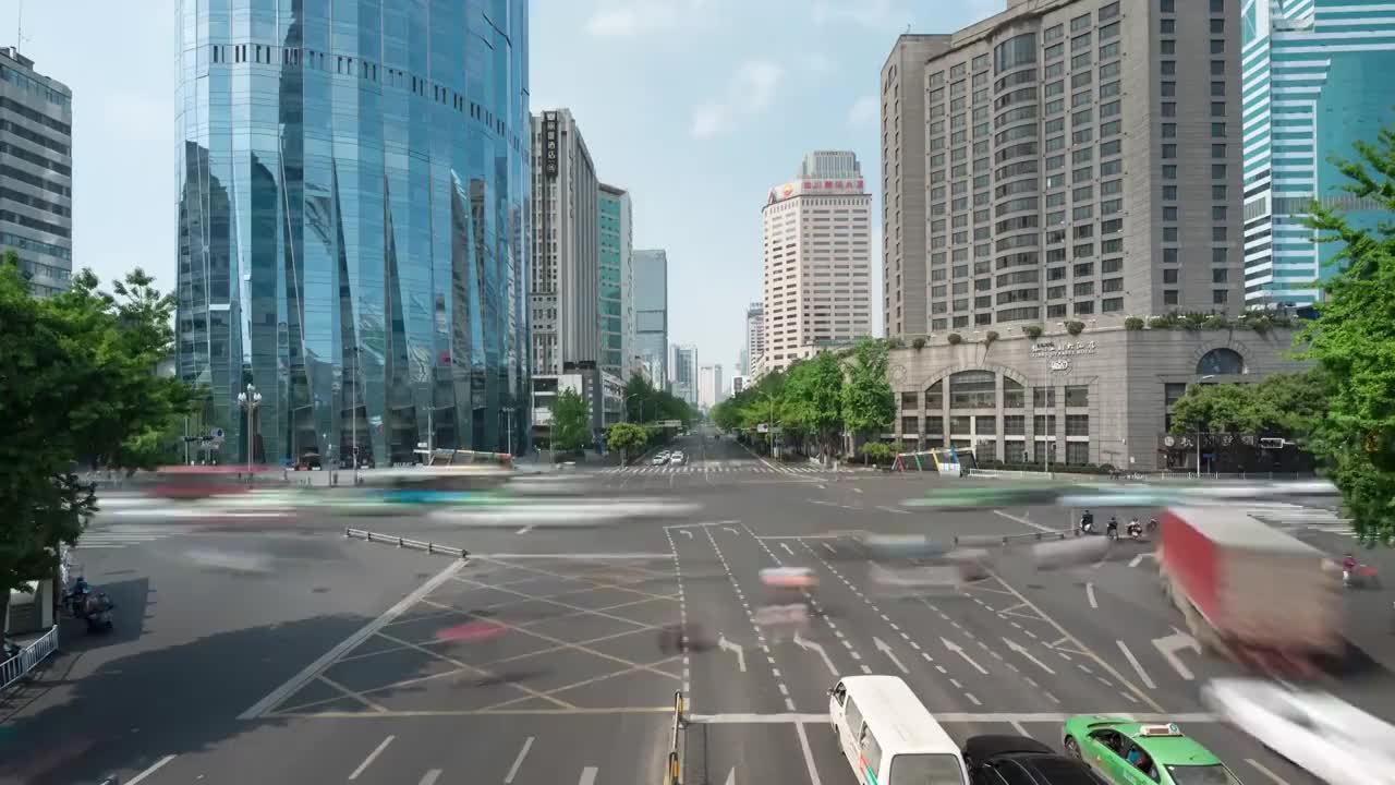 成都春熙路十字路口交通运输城市风光白昼晴天4K分辨率延时摄影视频素材