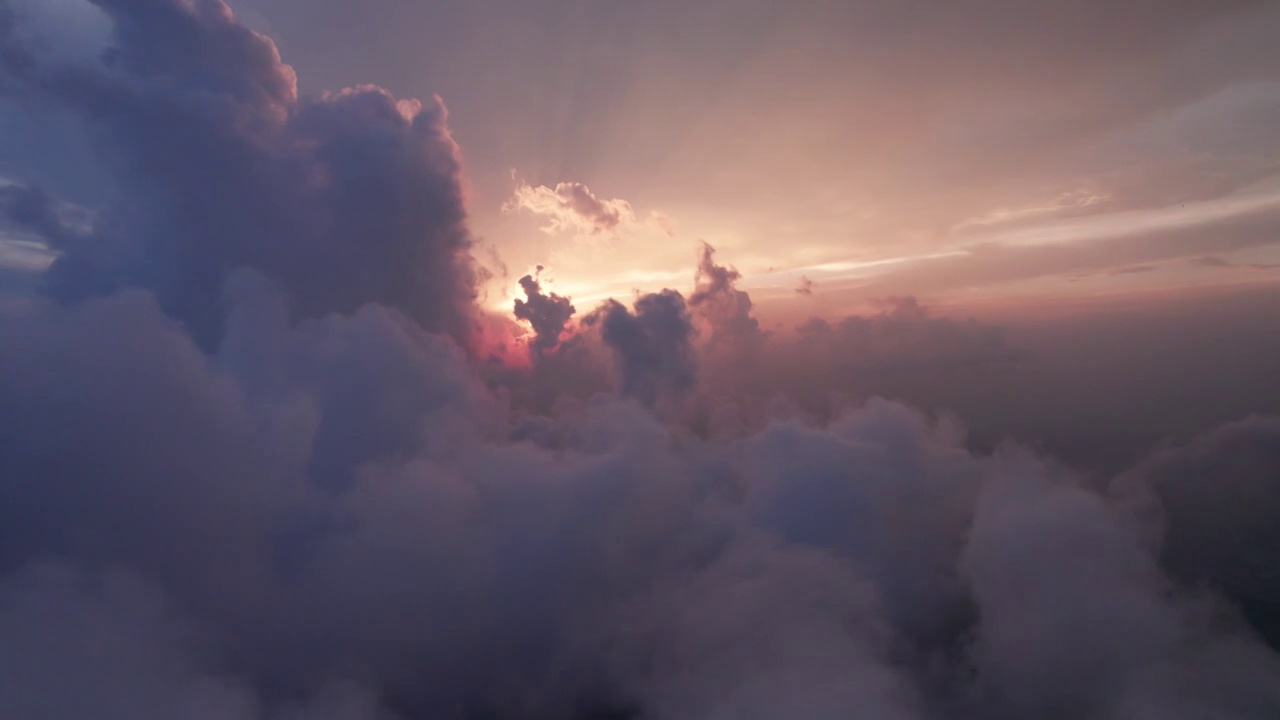 飞到云层上空看日落夕阳视频素材