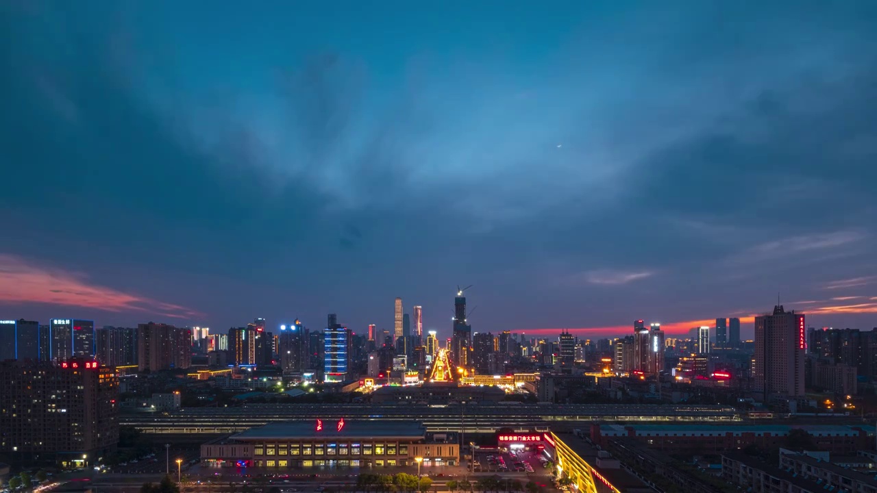 湖南省长沙市火车站日转夜延时，长沙晚霞延时视频素材