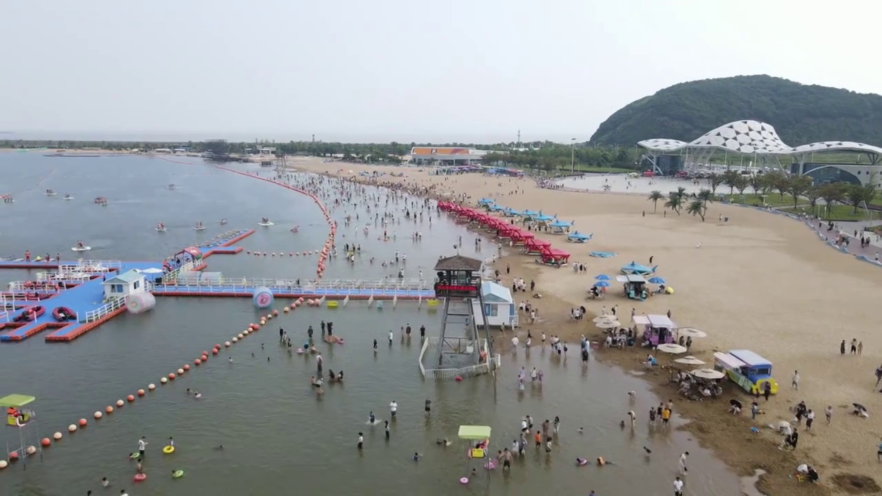 宁波北仑区梅山湾沙滩公园滨海沙滩4K航拍原素材视频素材