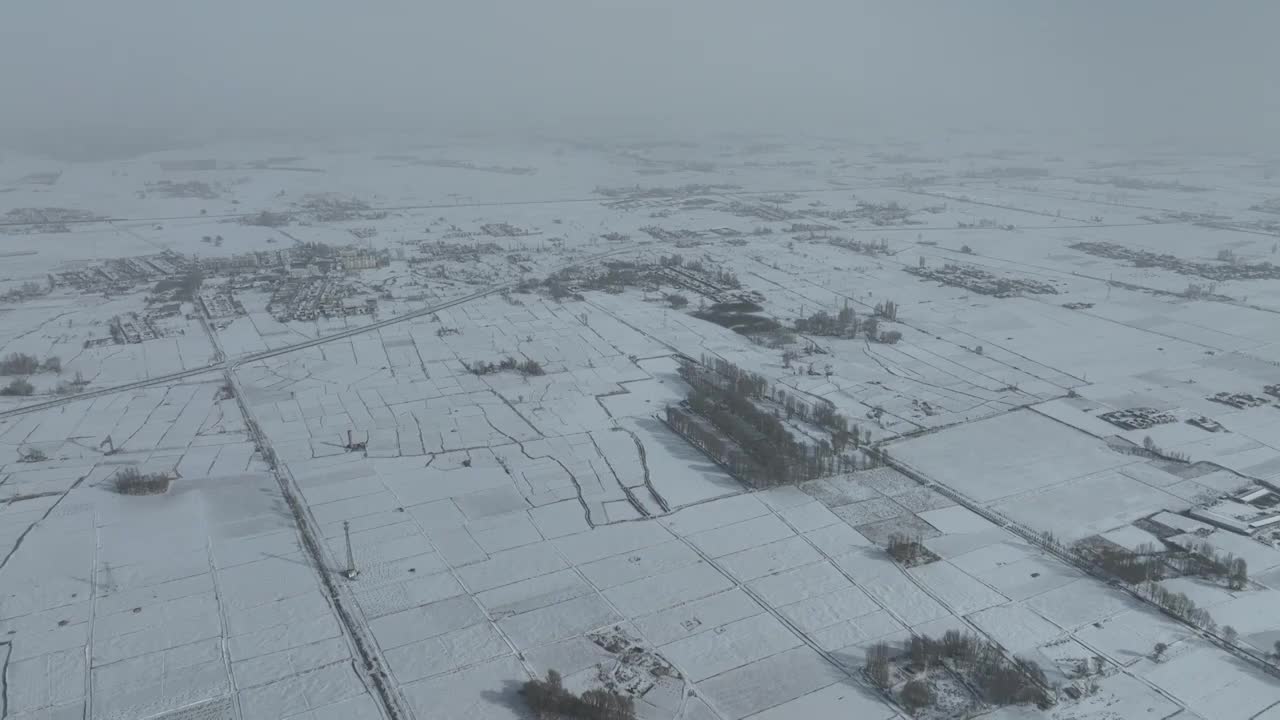 冬季雪景农田村庄视频素材