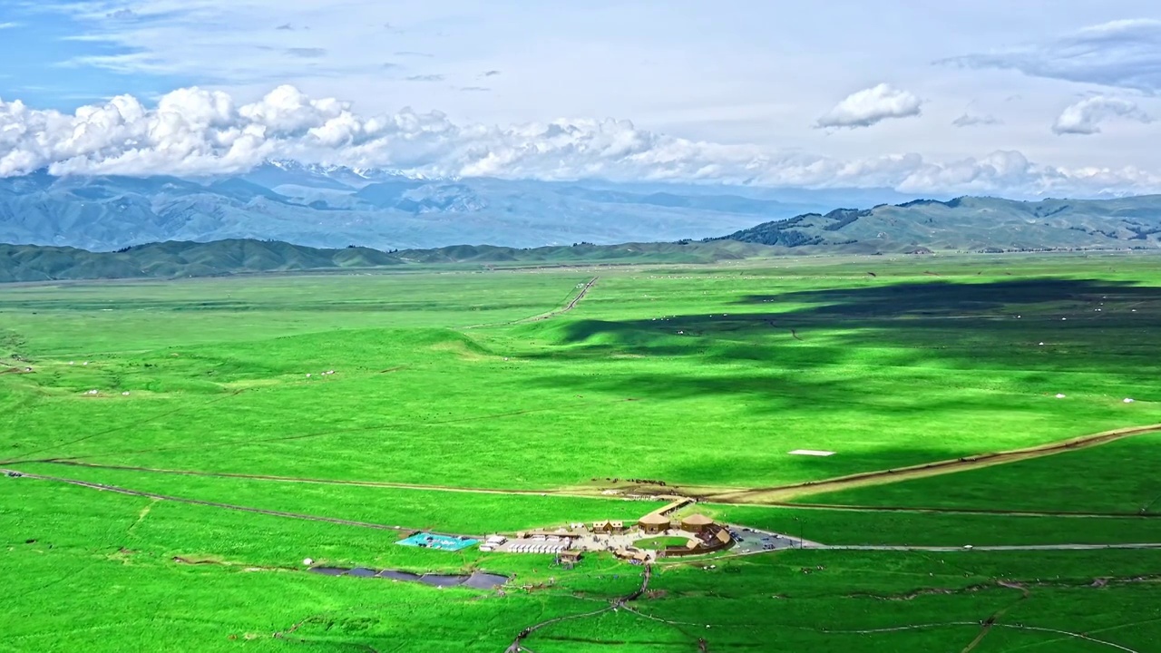 航拍中国新疆草原和山脉自然风光视频素材