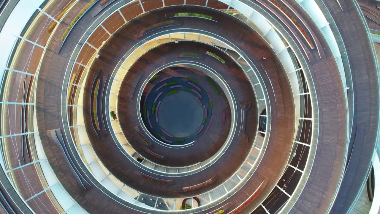 航拍湖南长沙梅溪湖城市岛圆形螺旋旋转楼梯视频素材