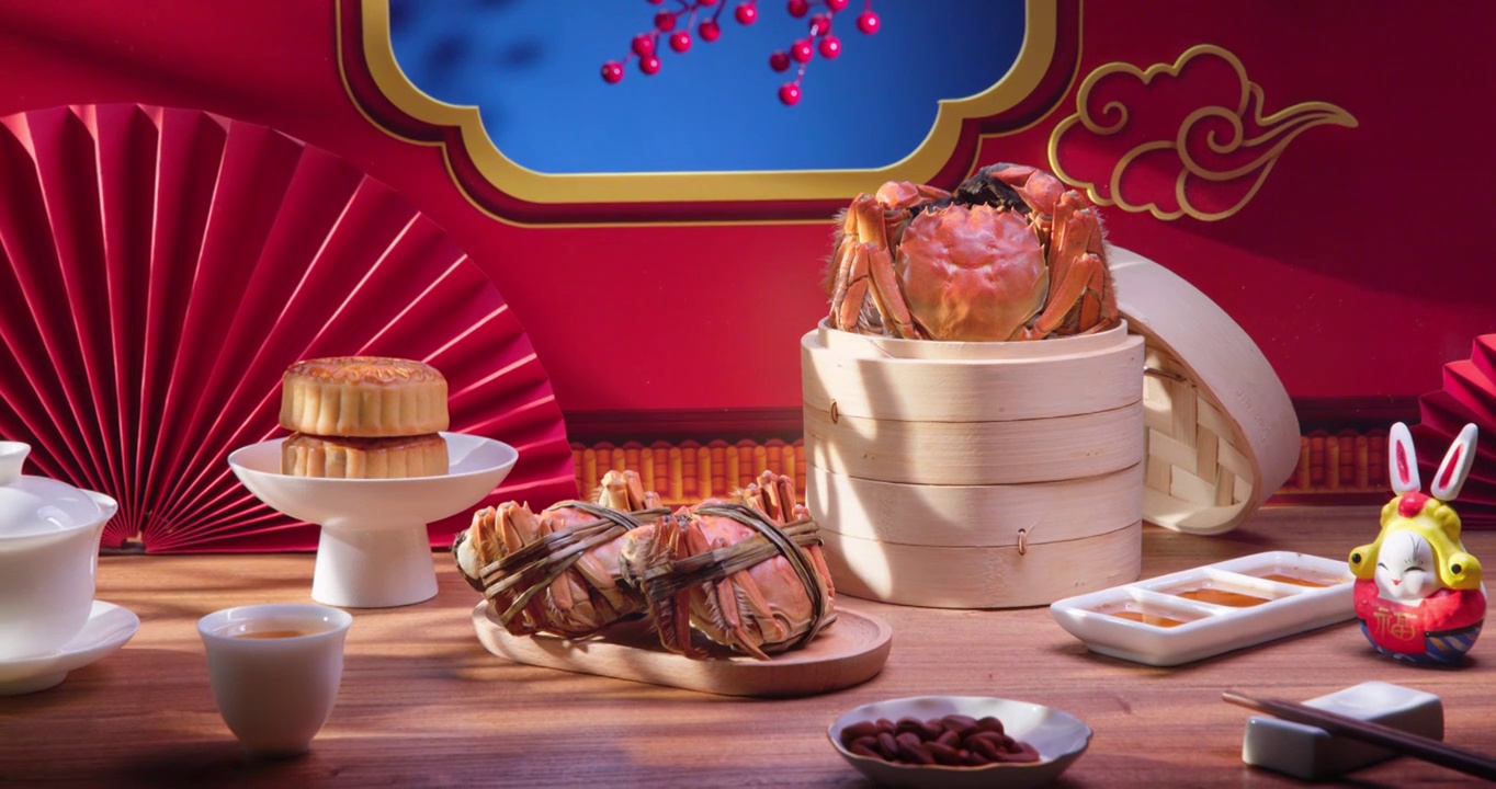 螃蟹红色装饰背景前的中秋节美食大闸蟹月饼视频购买