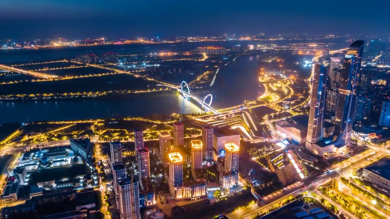 中国江苏南京青奥中心和南京眼大桥城市天际线航拍夜景延时摄影视频素材