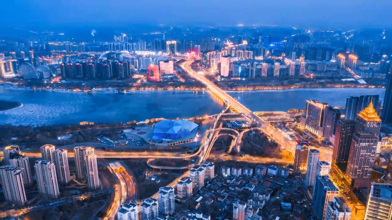 中国辽宁沈阳浑河沿岸城市天际线航拍夜景环绕延时摄影视频下载