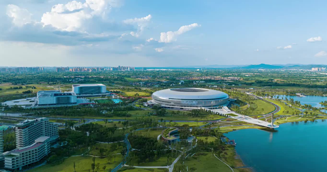 成都东安湖体育公园航拍延时蓝天白云城市景观视频素材