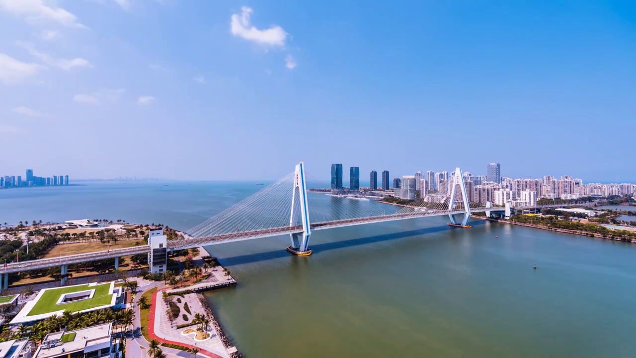 中国海南海口海甸河世纪大桥高视角航拍延时摄影视频素材