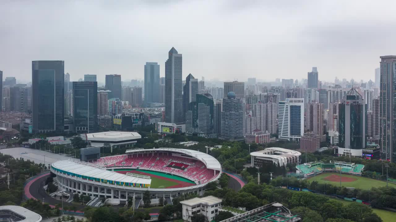 航拍视角下的广州城市天河体育场视频下载