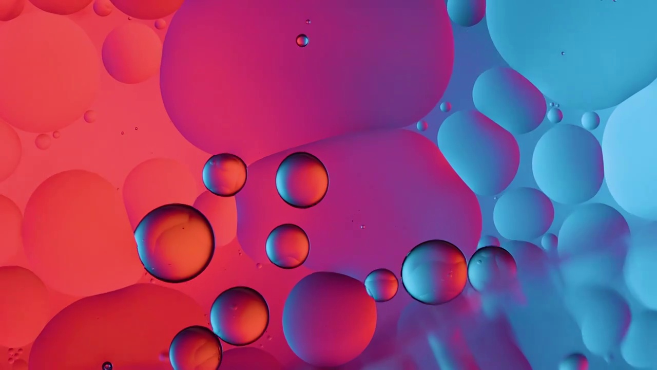 俯拍视图, 彩色的油滴在水面上视频下载