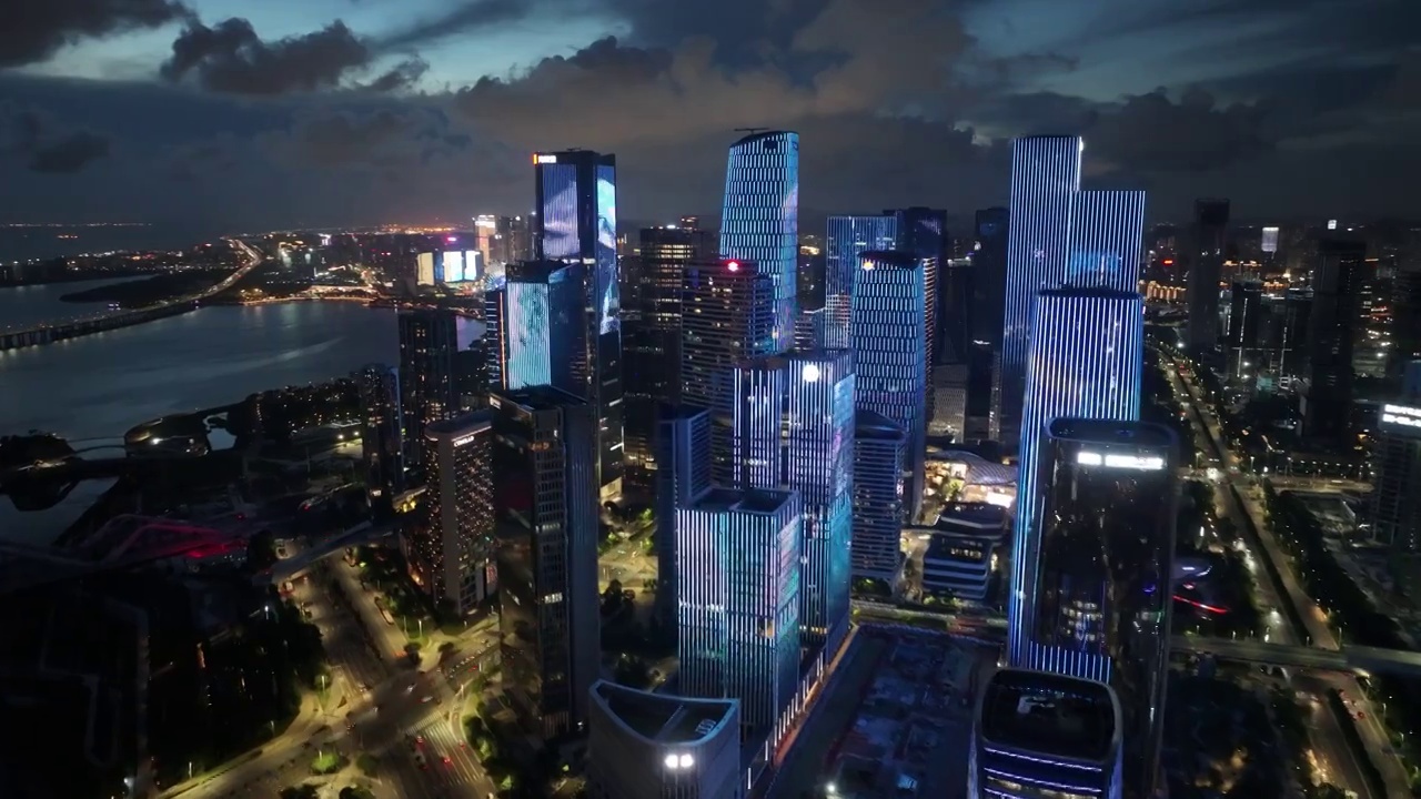 前海城市建筑群夜景灯光秀航拍视频素材