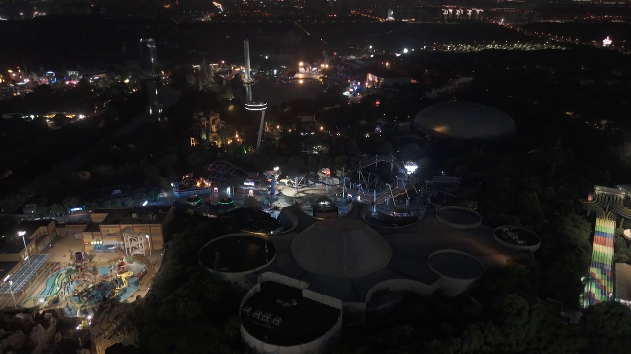 航拍上海玛雅海滩水公园鸟瞰夜景全景视频下载