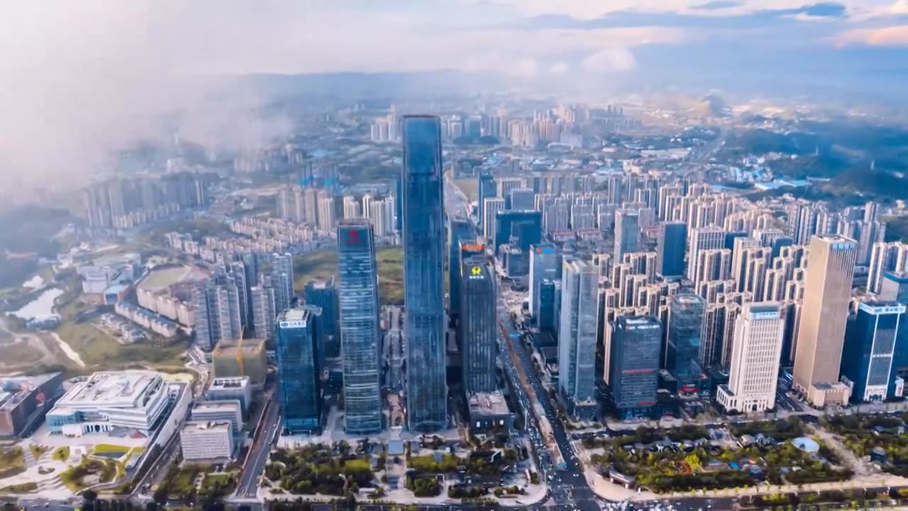 中国贵州贵阳国际金融中心CBD城市天际线和平流雾航拍延时摄影视频下载