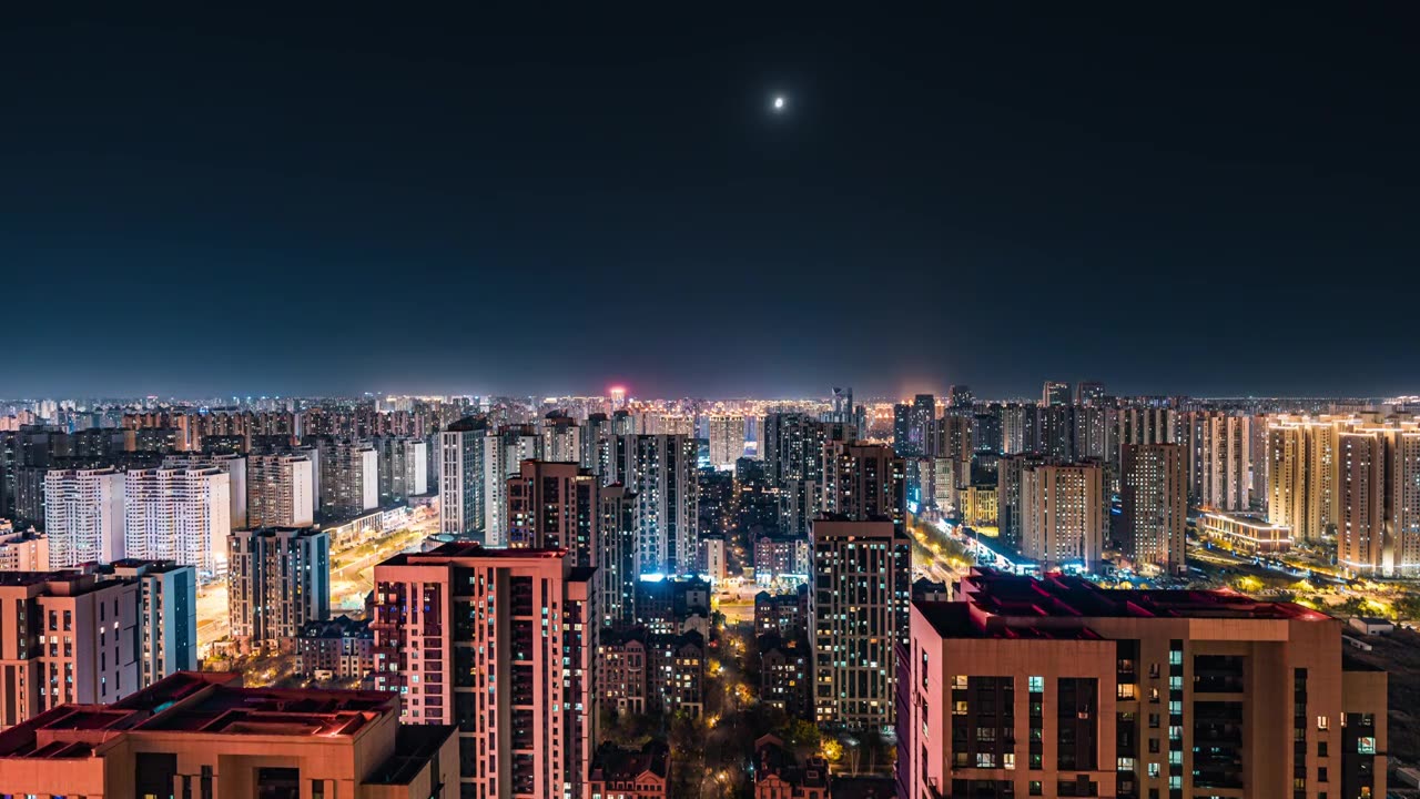 4K哈尔滨城市风光万家灯火月升延时摄影视频下载