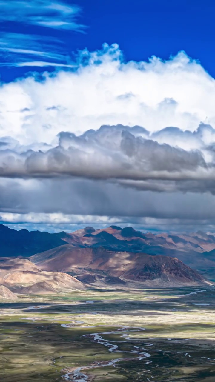 航拍西藏日喀则地区白昼风雨彩虹延迟风光视频下载