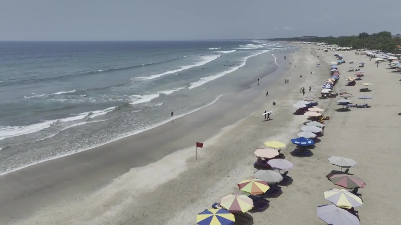 HDR印尼巴厘岛库塔海滩日光浴航拍风光视频下载