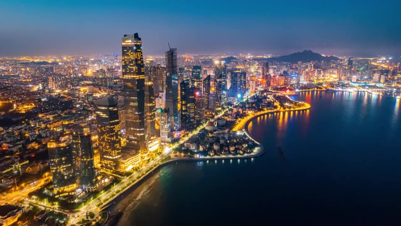 中国山东青岛海边城市夜景延时航拍视频下载