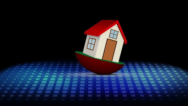 在黑色背景上的一个色度键空间之外的红色模型房子视频素材