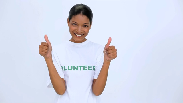 志愿者女生竖起拇指微笑特写视频素材