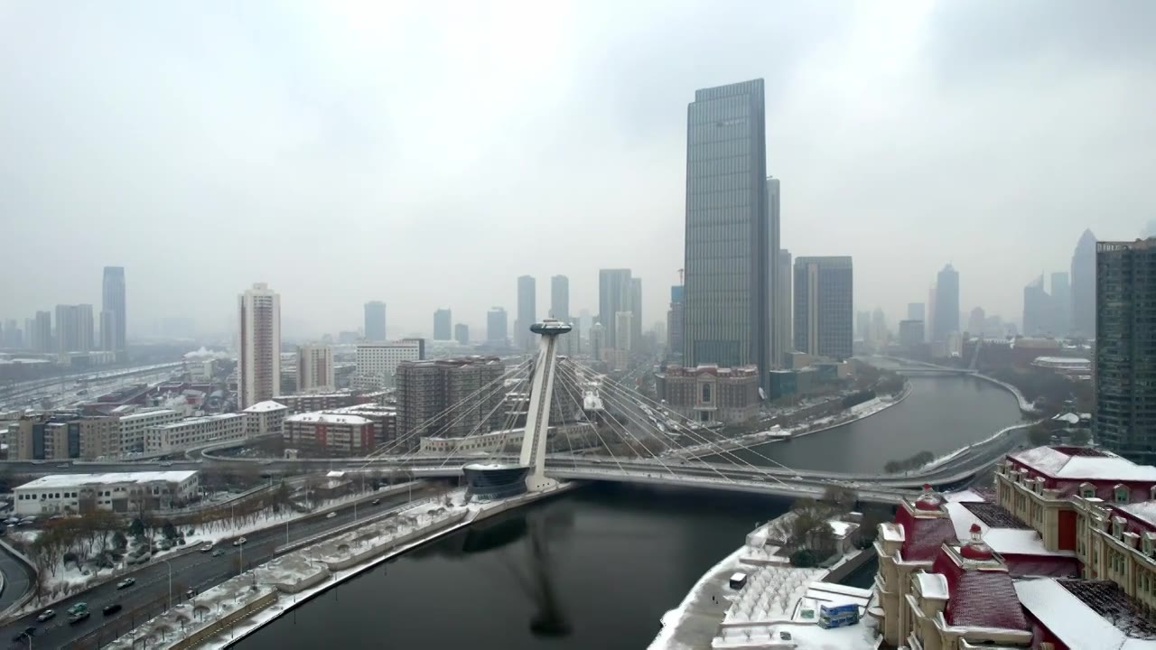 天津海河津湾广场城市建筑雪景风光航拍视频下载