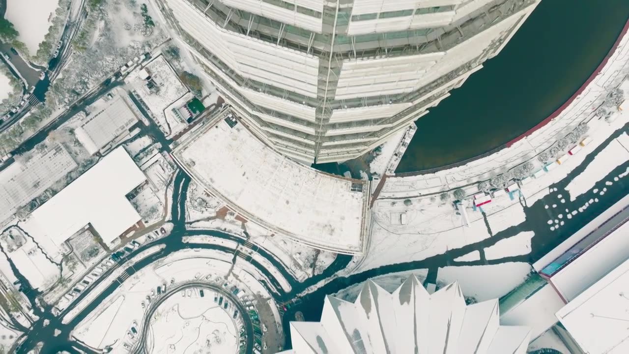 航拍郑州如意湖CBD雪景视频下载
