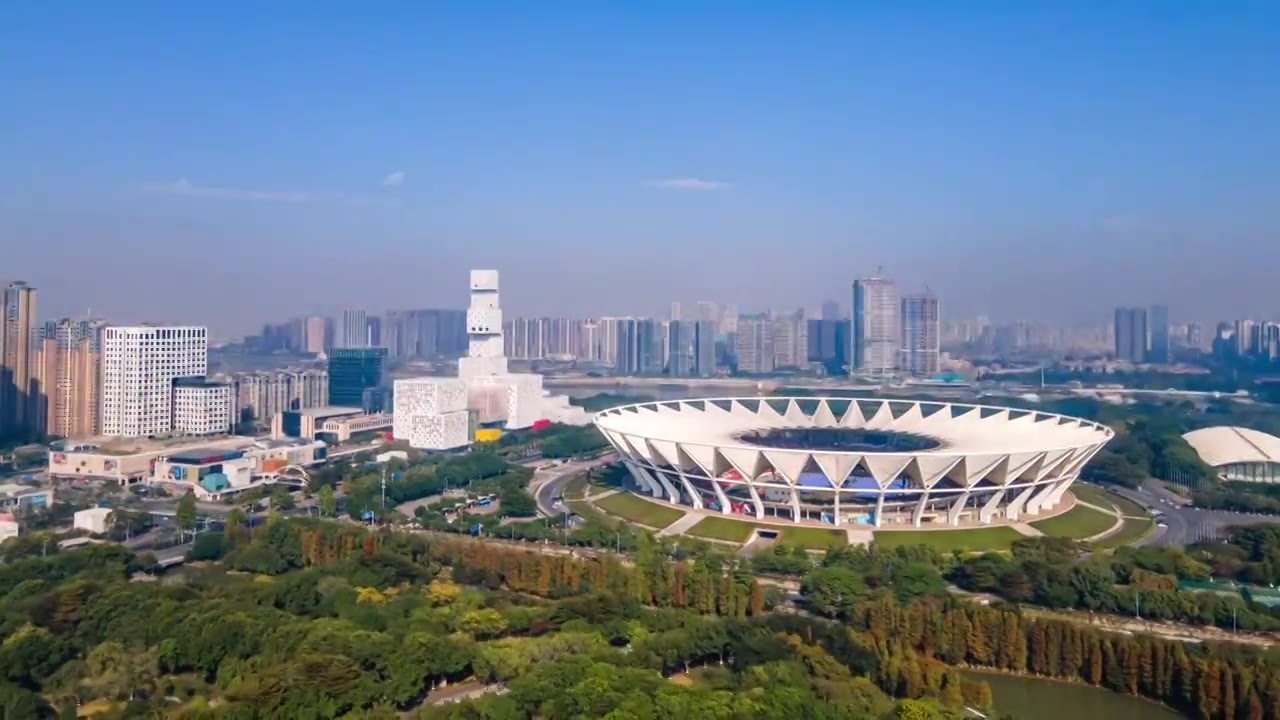 中国佛山世纪莲体育馆和佛山新城城市天际线延时摄影航拍视频下载