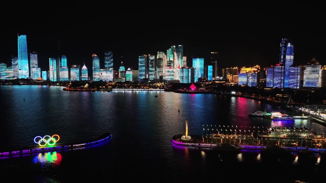 中国山东青岛五四广场灯光秀城市夜景航拍视频素材