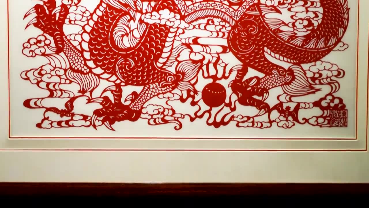 中国传统非遗文化，剪纸工艺，龙元素视频下载