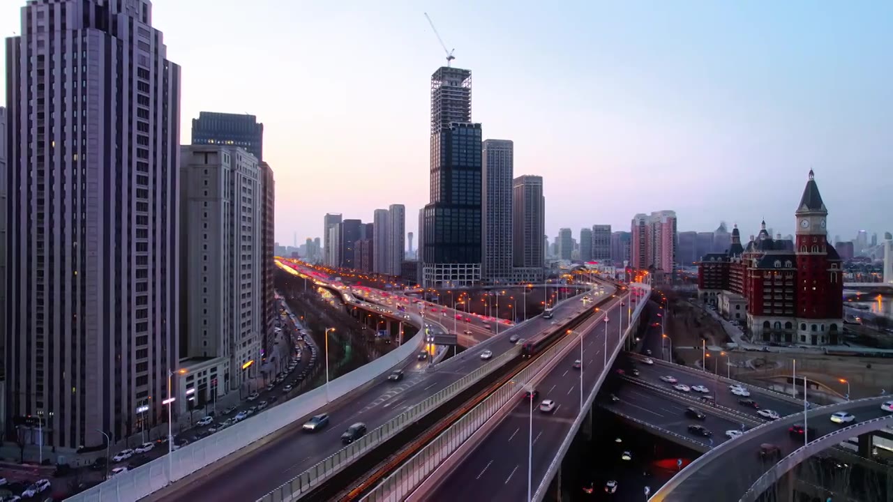 天津新八大里CBD城市商务中心建筑日落风光航拍视频素材