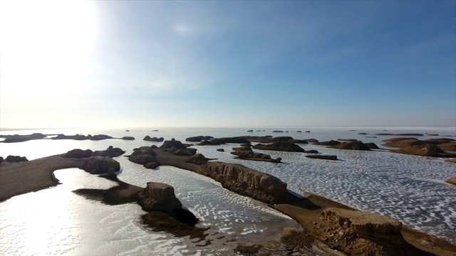航拍中国西部戈壁滩冰湖自然景观视频素材